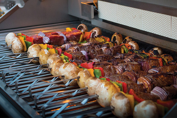 Even heat distribution across grill grates for consistent grilling results